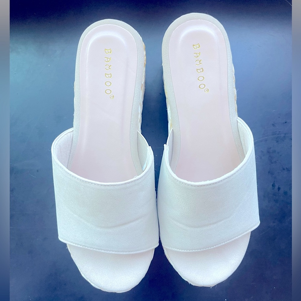 Cream slip on mules worn once just slightly too big. So cute!